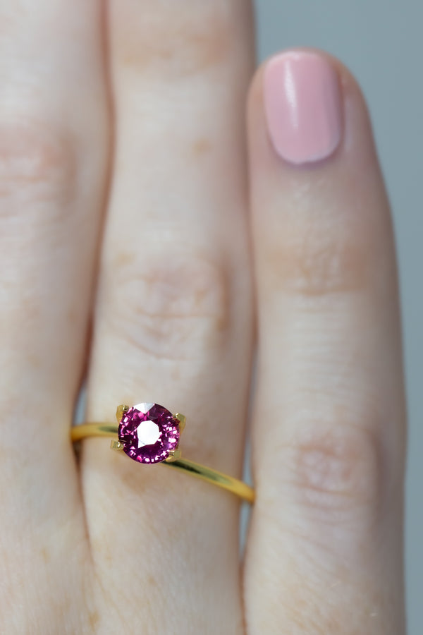 1.06Ct Vivid Hot Pink Mozambique Sapphire | Round Shape on finger