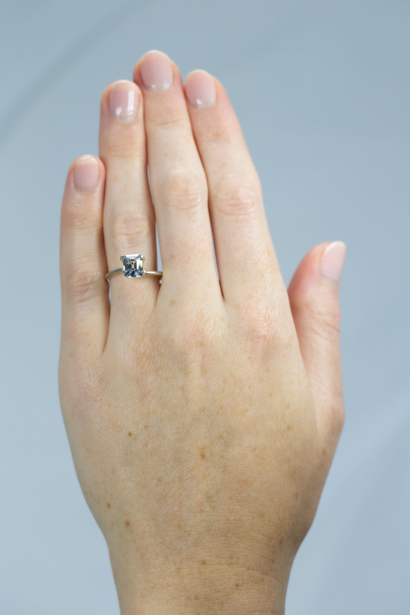 1.92Ct Very Light Blue Ceylon Sapphire | Emerald Shape on hand