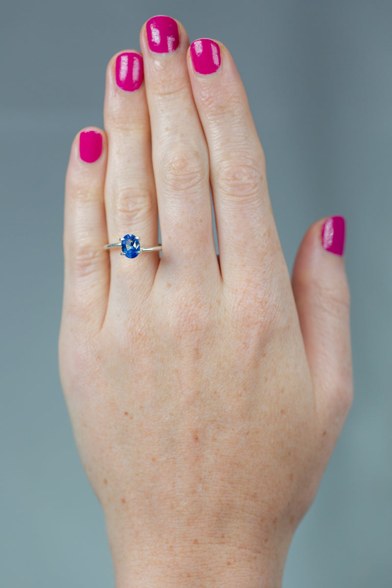 1.58Ct Sweet Blue Ceylon Sapphire | Oval Shape on hand