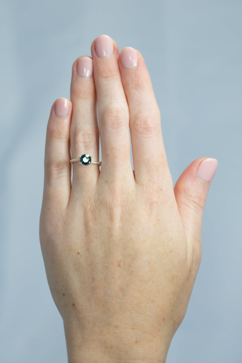 1.66Ct Intense Blue Green Madagascan Sapphire | Round Shape on hand