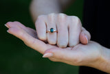  Forest Green Teal Sapphire & Pear Diamonds Ring on clenched fist
