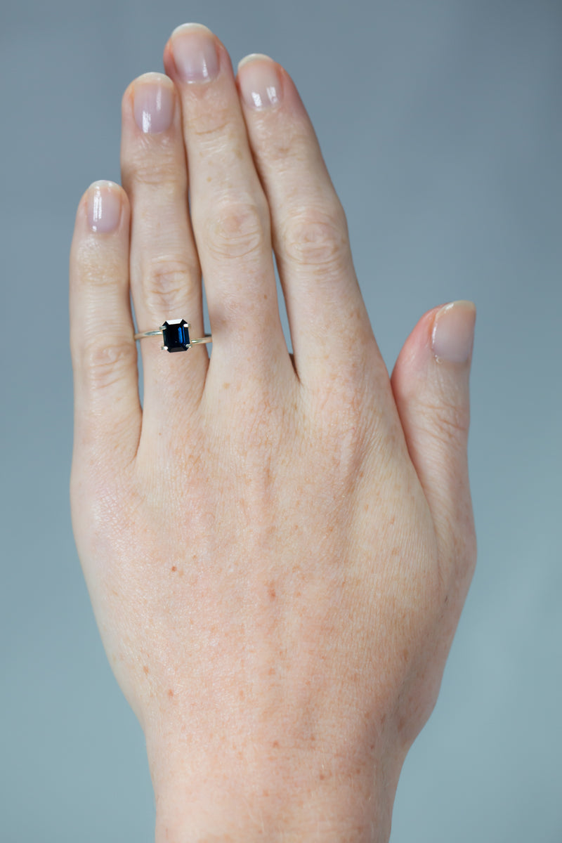 2.26Ct Vivid Blue (Basaltic) Madagascan Sapphire | Emerald Shape on hand