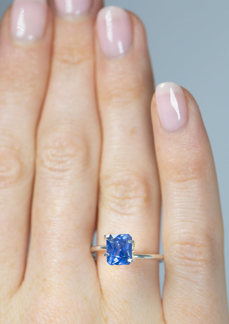 2.15Ct Cornflower Blue Sapphire  Emerald Shape from Sri Lanka on ring finger