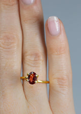 Beautiful 1.52Ct Reddish Orange Sunset Padparadscha Sapphire | Oval Shape from Sri Lanka on hand