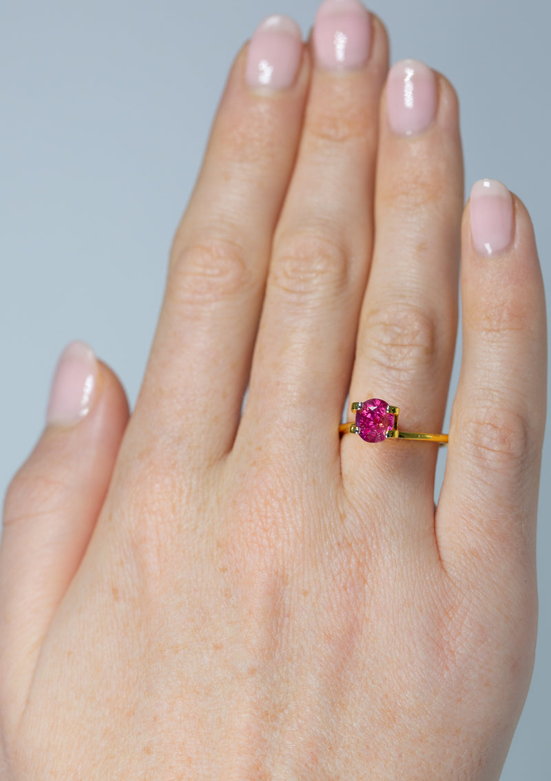 2.03Ct Hot Pink Sapphire | Oval Shape from Sri Lanka in ring finger
