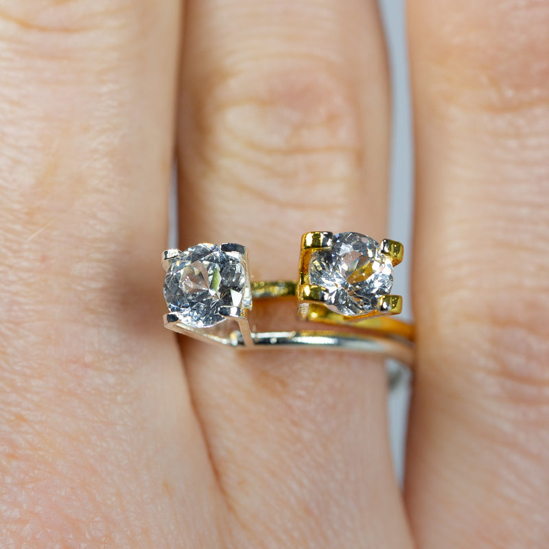 Exceptional pair of 2.21Ct White Pair Sapphire | Round Shape from Sri Lanka on ring finger