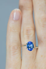 3.06Ct Vivid Sweet Blue Ceylon Sapphire | Oval Shape on ring finger