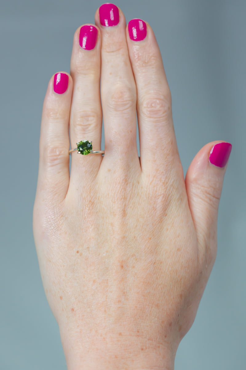 2.58Ct Deep Leaf Green Ceylon Sapphire | Round Shape on hand