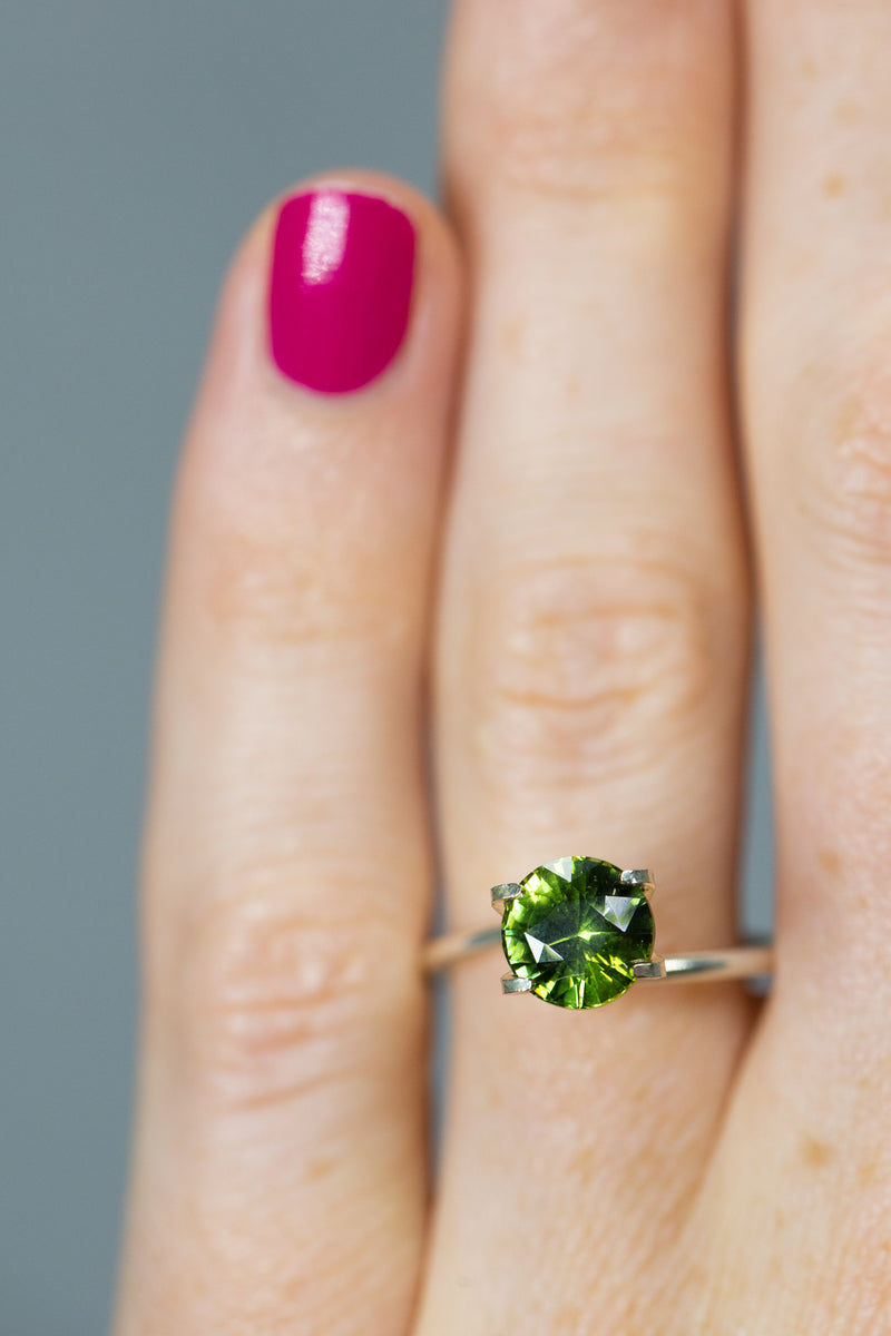 2.58Ct Deep Leaf Green Ceylon Sapphire | Round Shape on ring finger