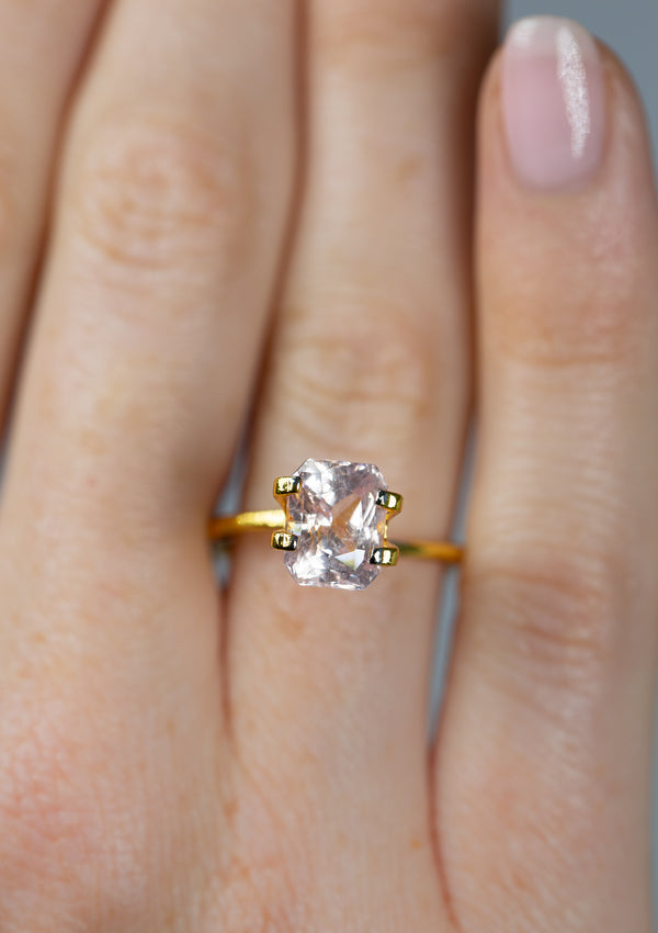 3.58Ct Light Peach Sapphire | Emerald Shape from Sri Lanka on ring finger