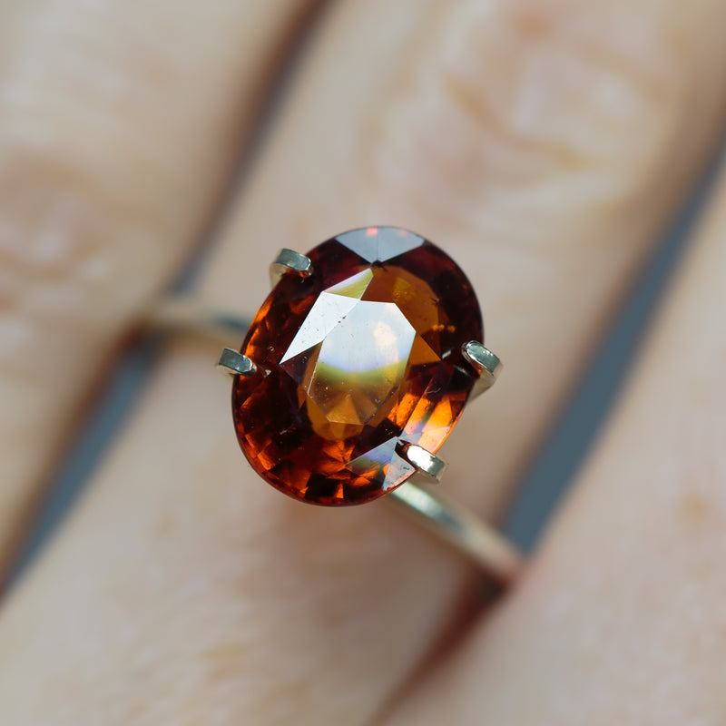 4.3Ct Deep Orange Brown Hessonite Garnet | Oval Shape closeup angle