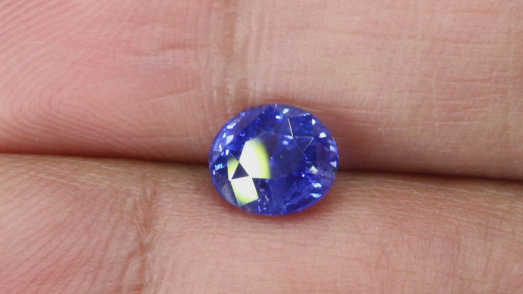 Video of 2.03Ct Cornflower Blue Sapphire | Oval Shape between fingers