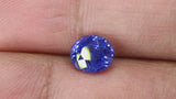 Video of 2.03Ct Cornflower Blue Sapphire | Oval Shape between fingers